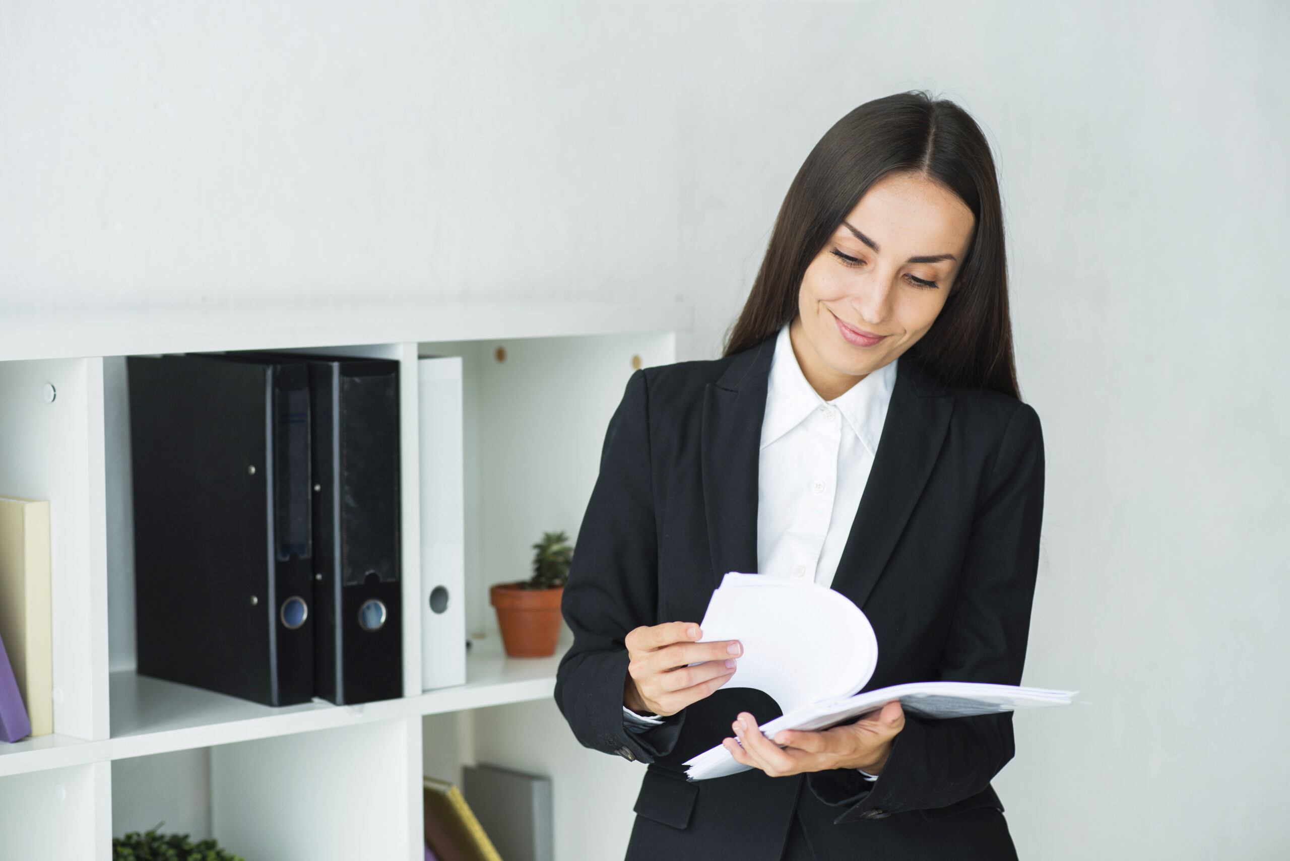 Businesswoman Examining Accounting Documents